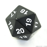 A massively big black die.
