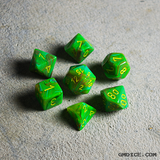 Green slime dice on concrete, like what you'd find in underground sewers.